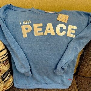 Peace Love World size xs/s sweatshirt. Light blue.